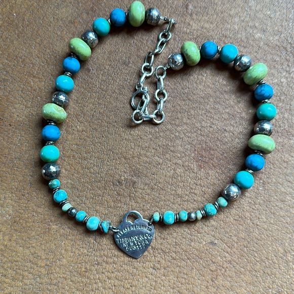 Necklace and bracelet set. Has a Tiffany and Company charm. - Picture 2 of 9